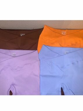 Women’s Colorful Seamless Ribbed V-Waist OQQ 4 Pack Bundle of Workout Shorts